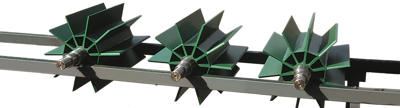 Efficient rotary airlock valves coated with FEP non-stick material for improved performance in handling bulk materials.